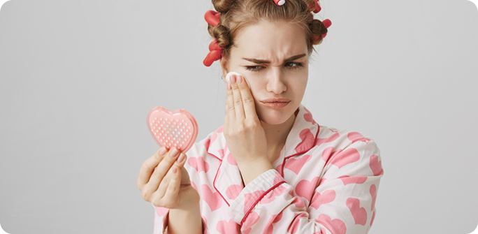 Skin Kneads aesthetician performing facial treatment Manhattan NYC